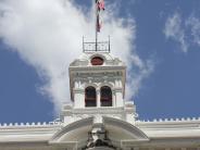 Flags flying half-staff above the courthouse