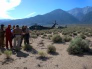 Mutual Aid Search for a Missing Hiker on Boundary Peak