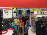 Bishop Police Officer Scida shopping with kids