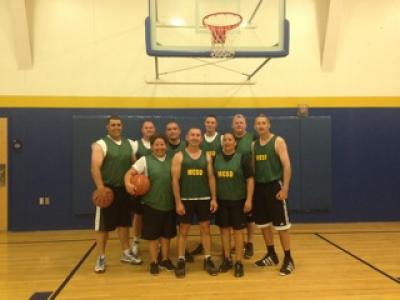 Cops and kids on basketball court